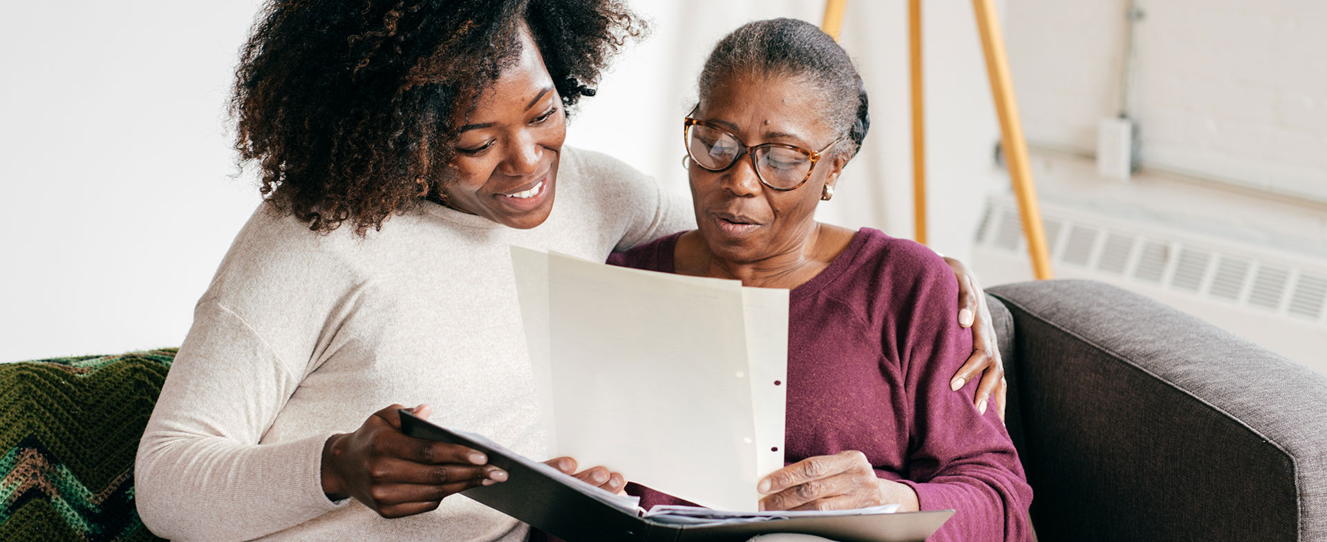 caregiver reading with mom