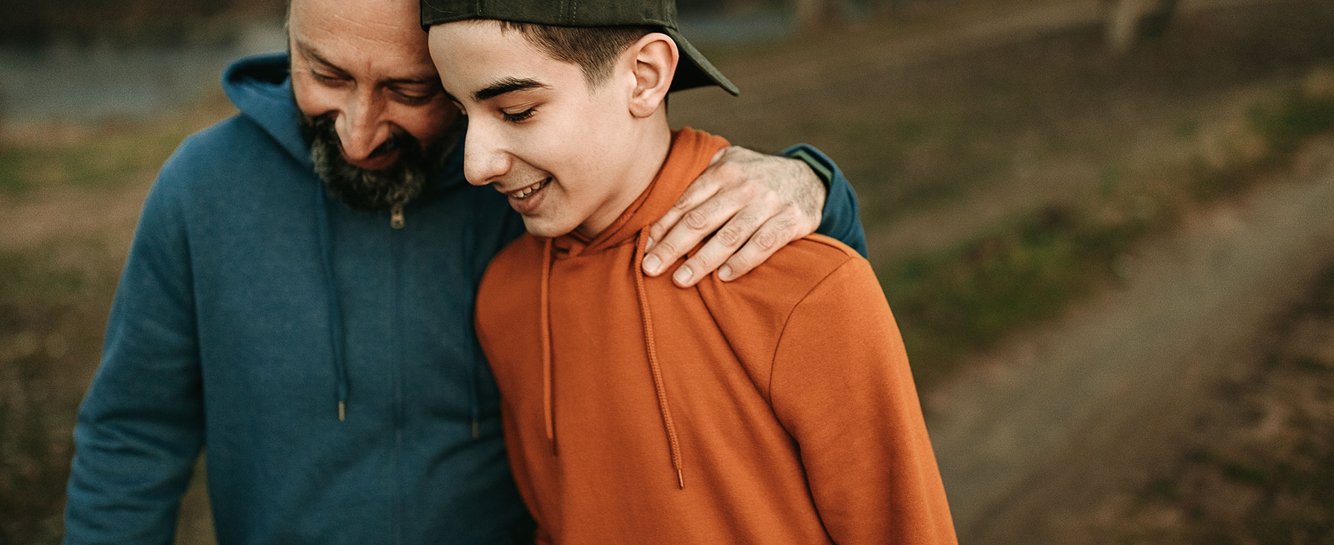 father and son walking