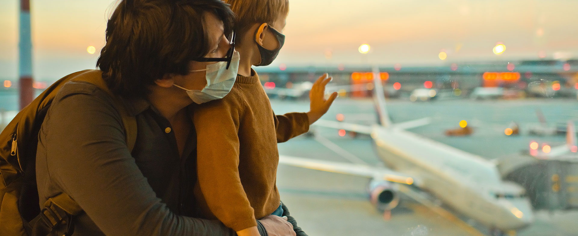 father and son at airport