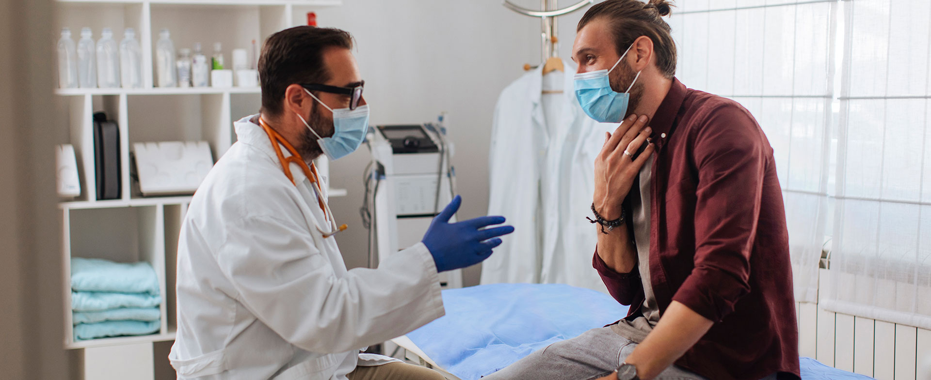 man talking to doctor
