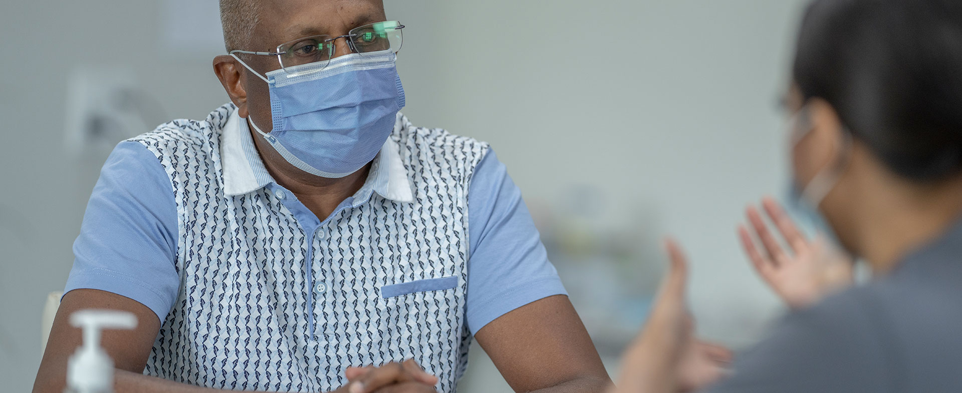 patient talking to doctor