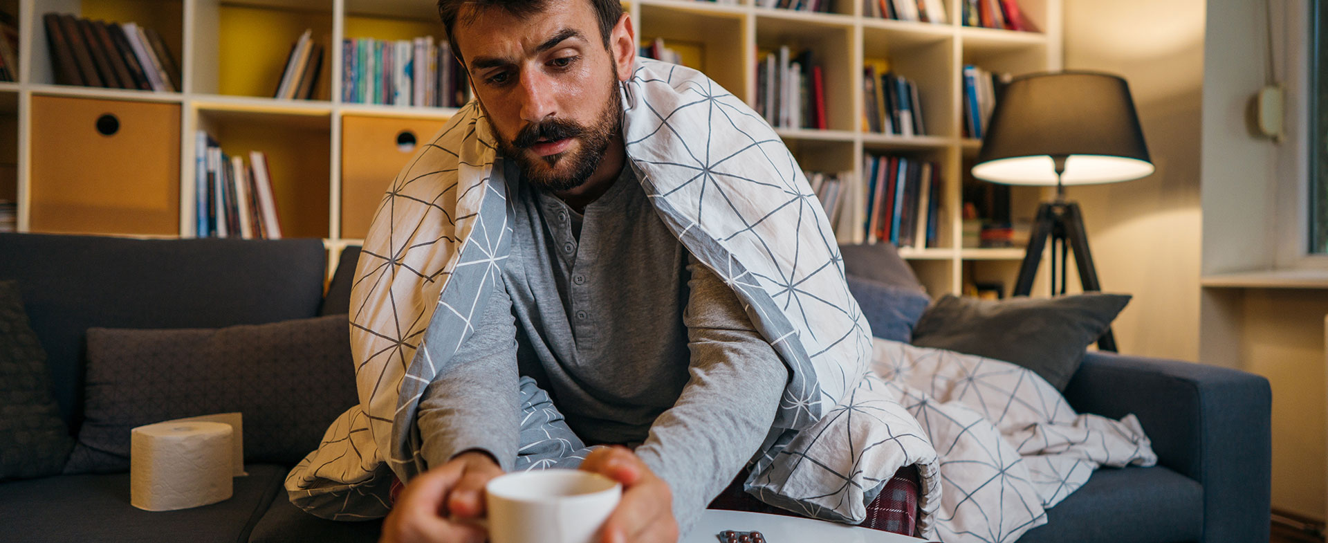 man sick at home