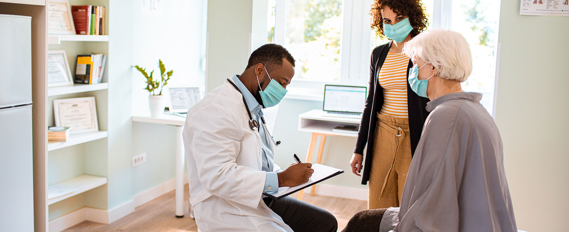patient and family talking to doctor