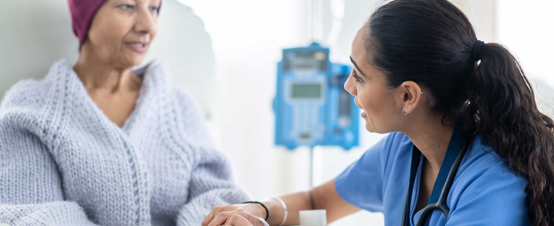 nurse talking to patient