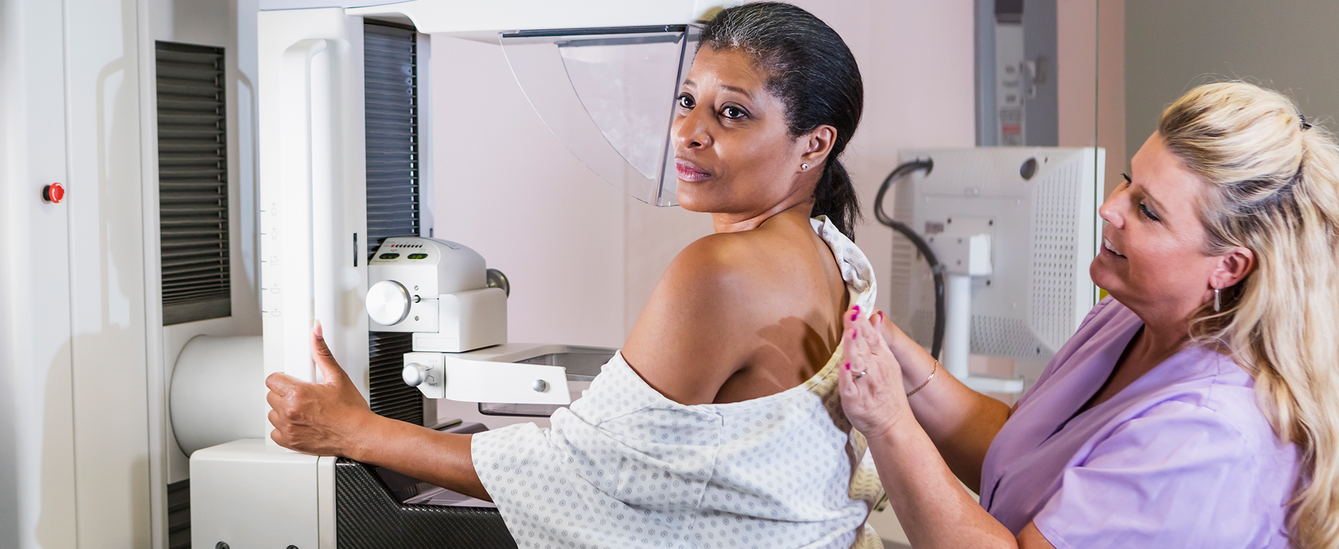 woman getting mammogram