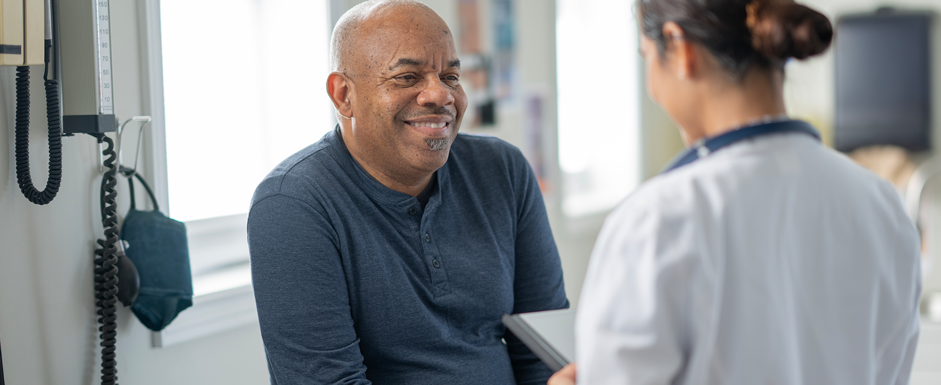 doctor talking to patient