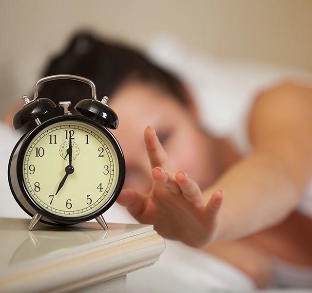 snoozing alarm clock