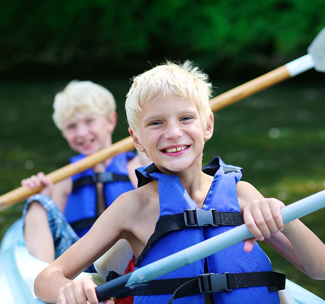 boys kayaking