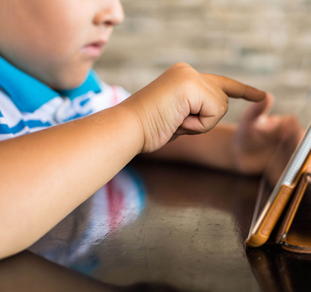 child using an ipad