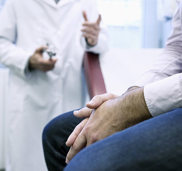 male patient with folded hands