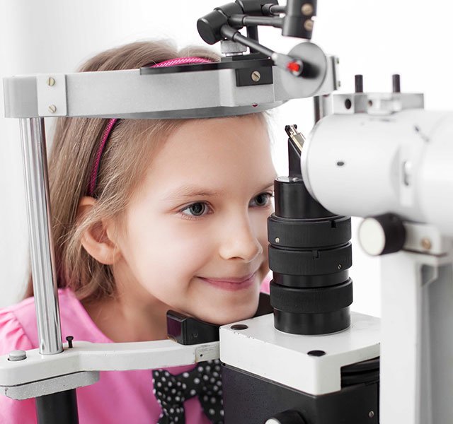 young girl getting an eye exam