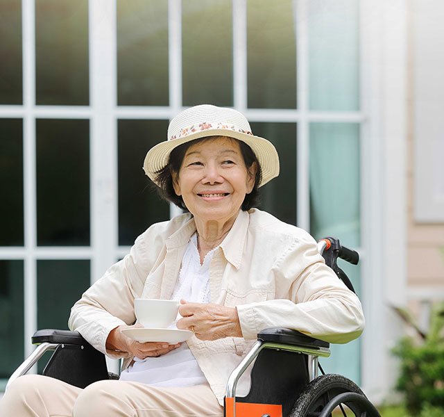 older woman sitting in wheel chair