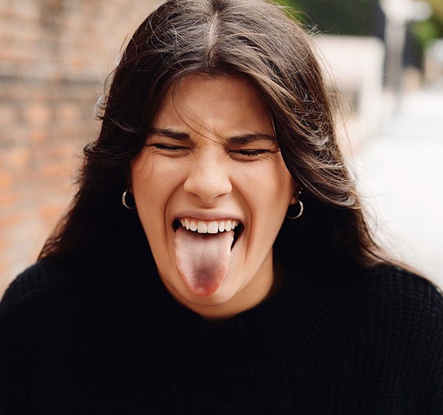 girl sticking her tongue out