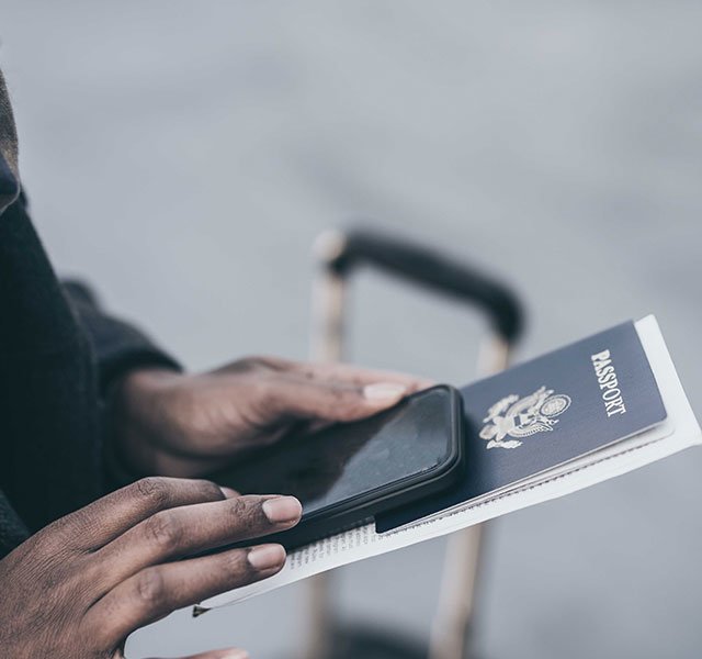 hands holding a passport