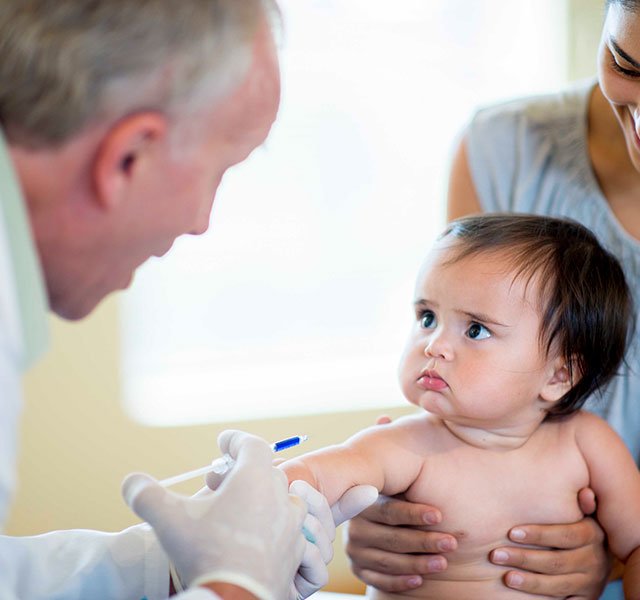 infant getting vaccinated