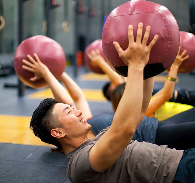 man with medicine ball