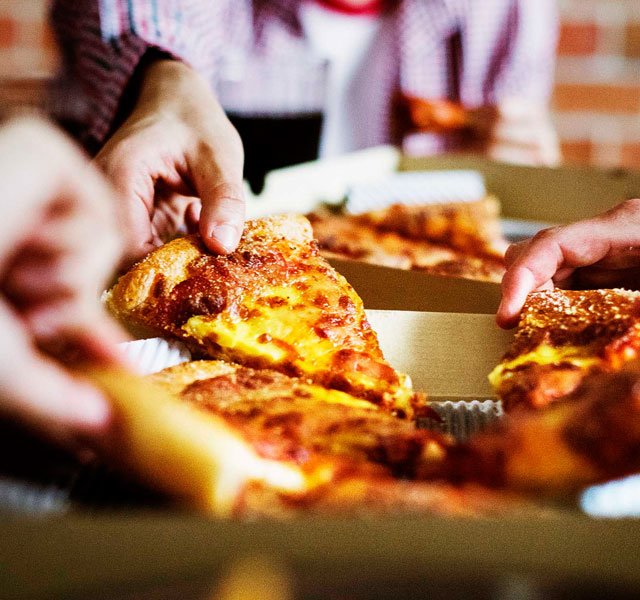 people eating pizza
