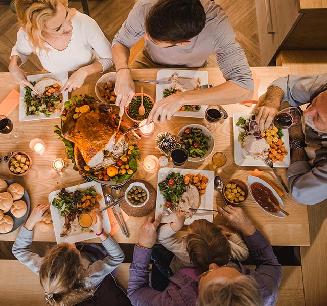 Eating with a group of people on a table