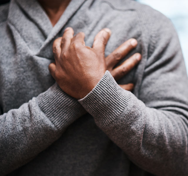 man holding heart