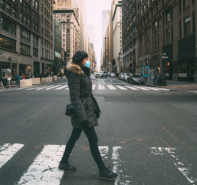 woman crossing the street