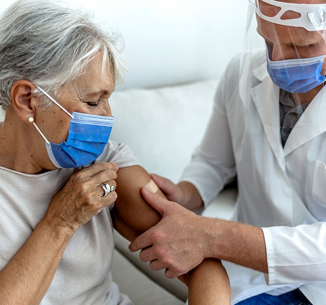 woman getting vaccinated
