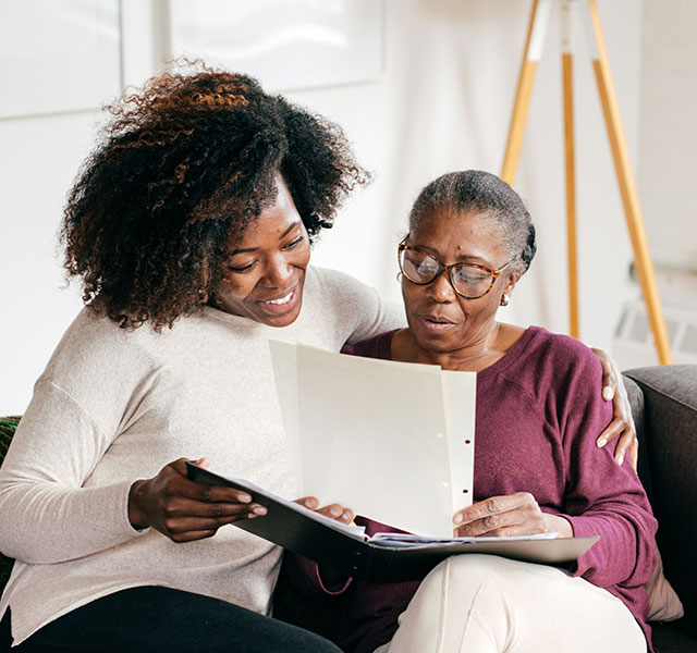 caregiver reading with mom