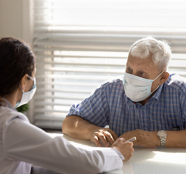 patient talking to doctor