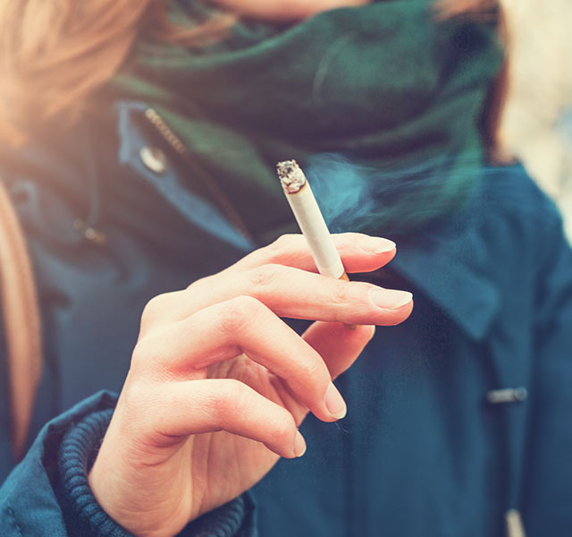 woman smoking outside
