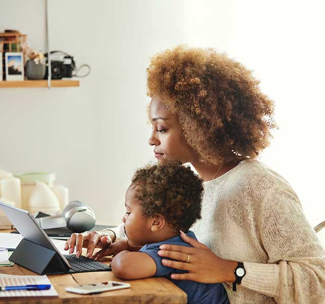 Mother and son on laptop