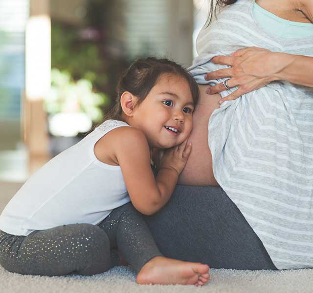 Pregnant mom with child