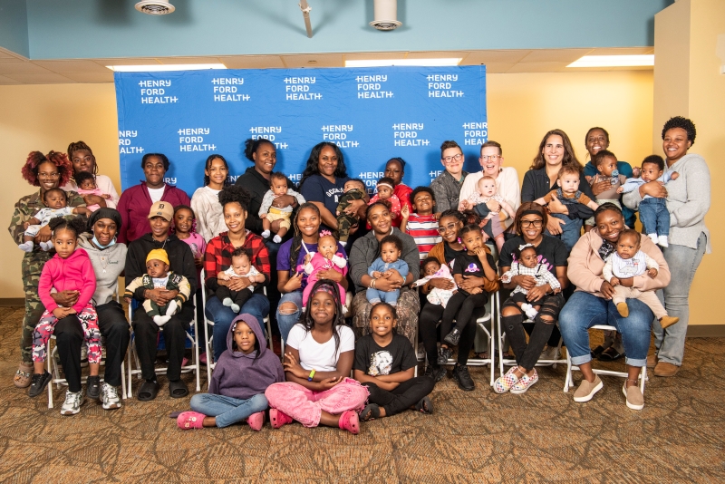 WIN Network group prenatal care participants and their children pose together for a reunion photo in October 2025, celebrating community, connection, and continued support beyond pregnancy.