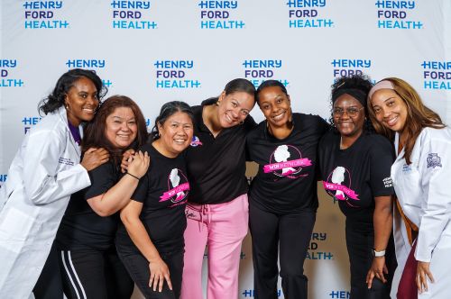 WIN Network certified nurse midwives, community health workers, manager, and supervisor pose together, highlighting teamwork and shared commitment to group prenatal care.