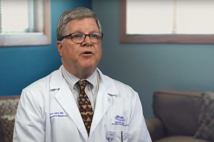 Henry Ford physician sitting in his office