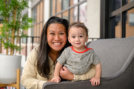Maris posed with child outdoors