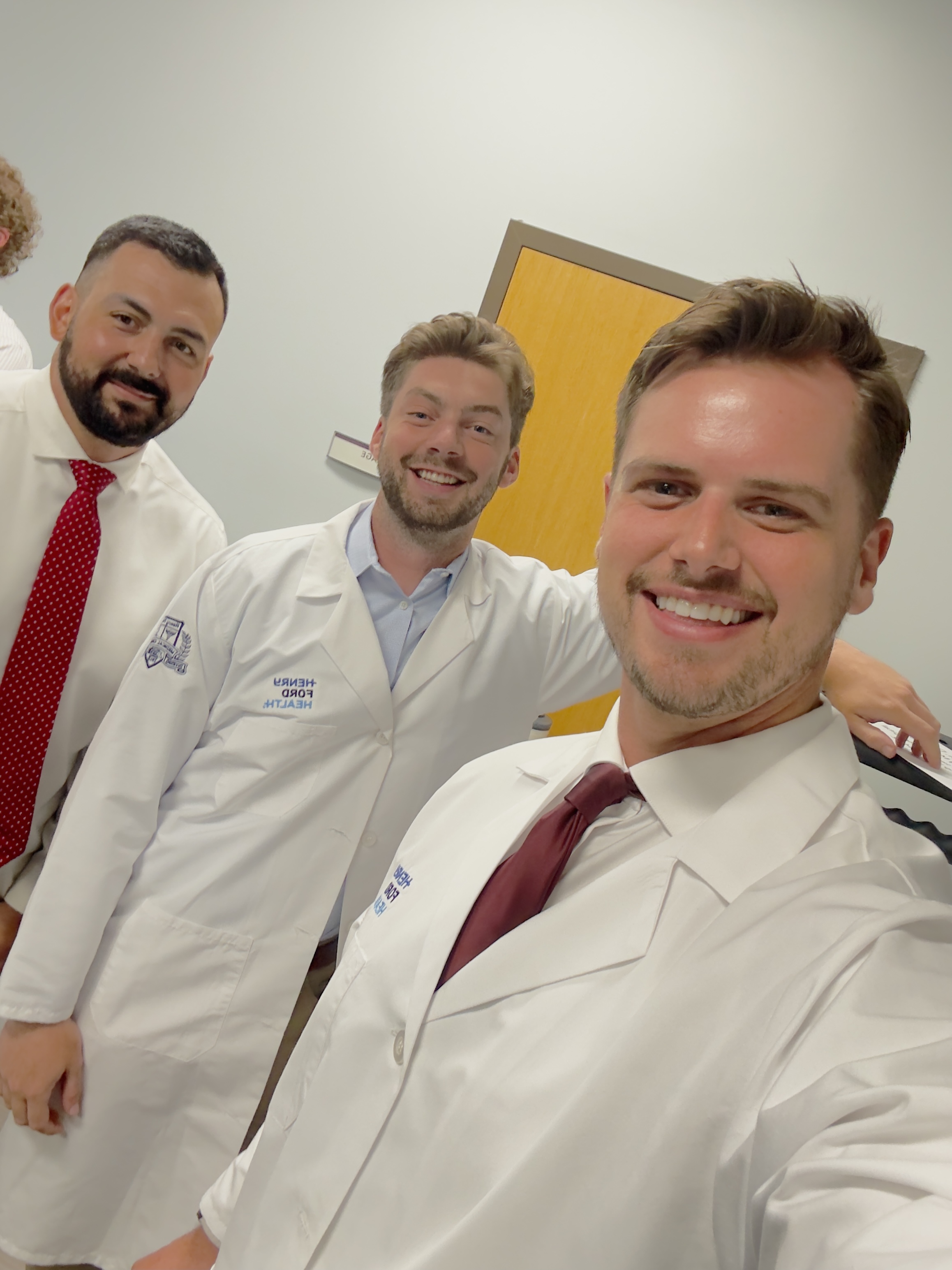 Residents taking selfie in clinic