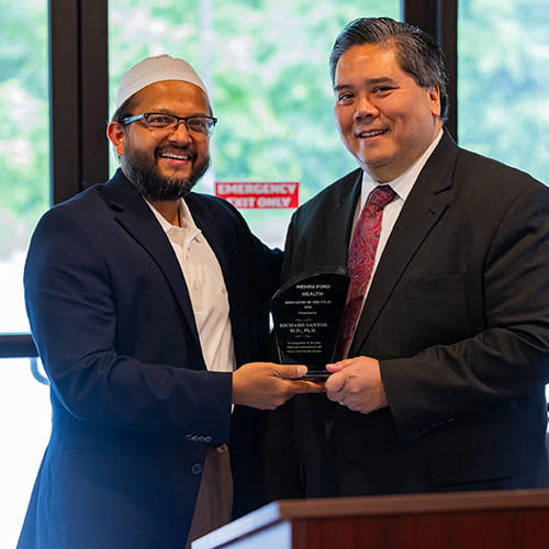 Two colleagues shaking hands