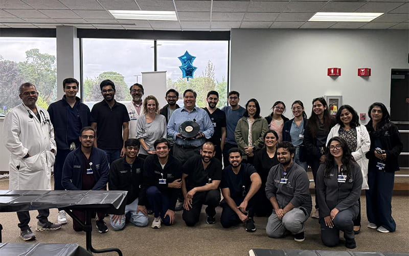 Group of doctors and residents posing for a group picture