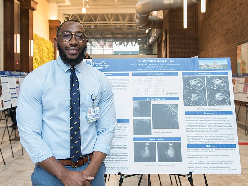 Fellow with research poster 2