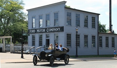 A street in Greenfield Village featuring a classic Ford car