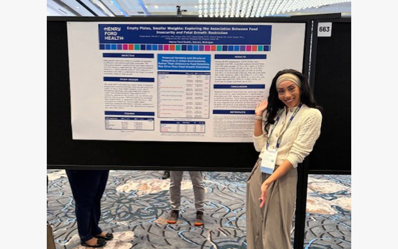 Dr Karrar presenting-her-poster-at-SMFM-2025
