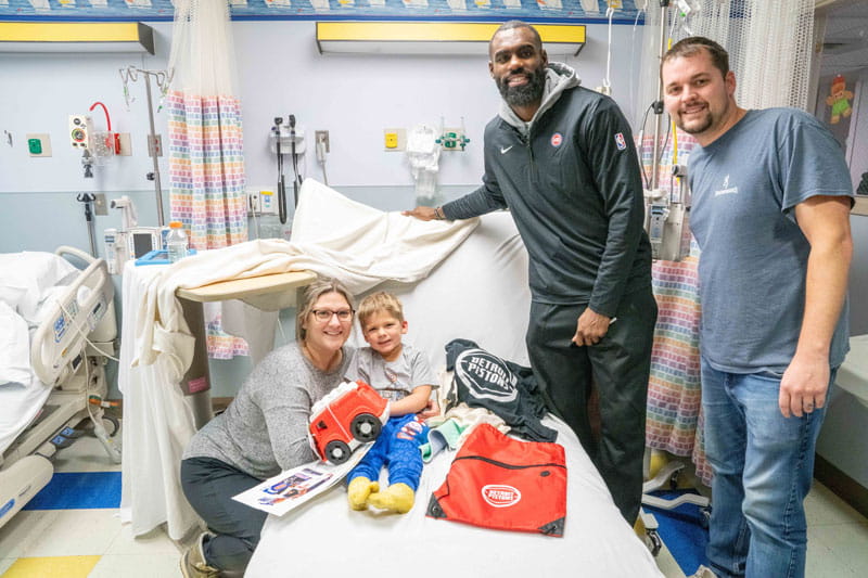 Detroit Pistons player visiting kids on the inpatient unit at Henry Ford St. John Hospital