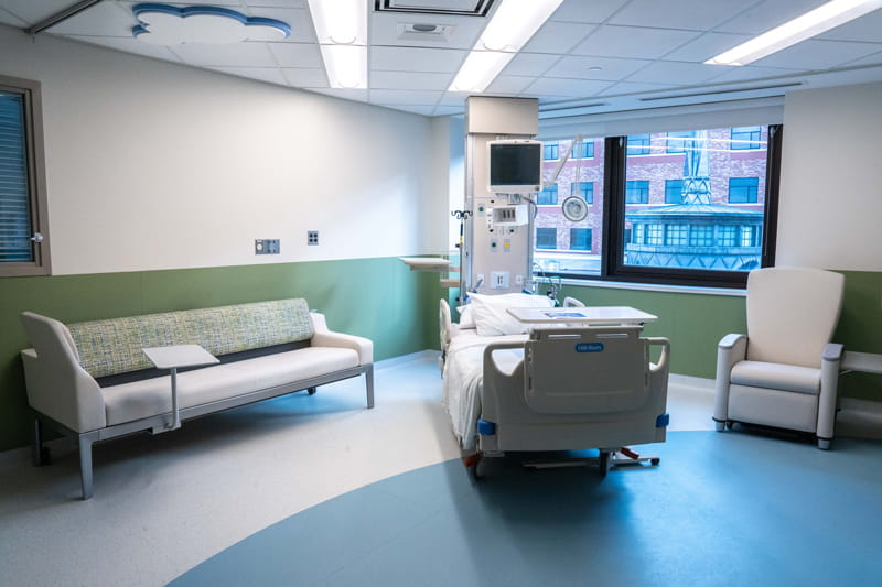 In patient room with a bed in the PICU at Henry Ford St. John Hospital