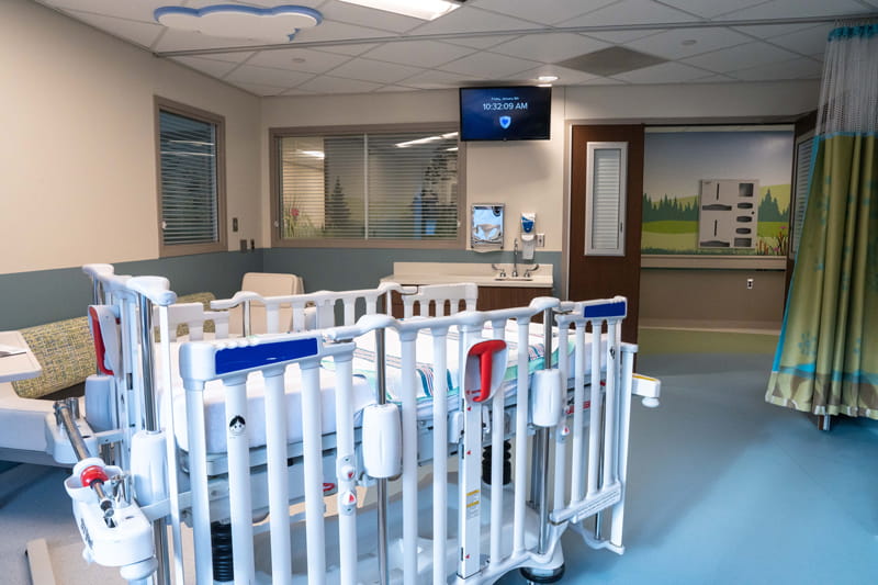 Room in the pediatric intensive care unit with a crib at Henry Ford St. John Hospital