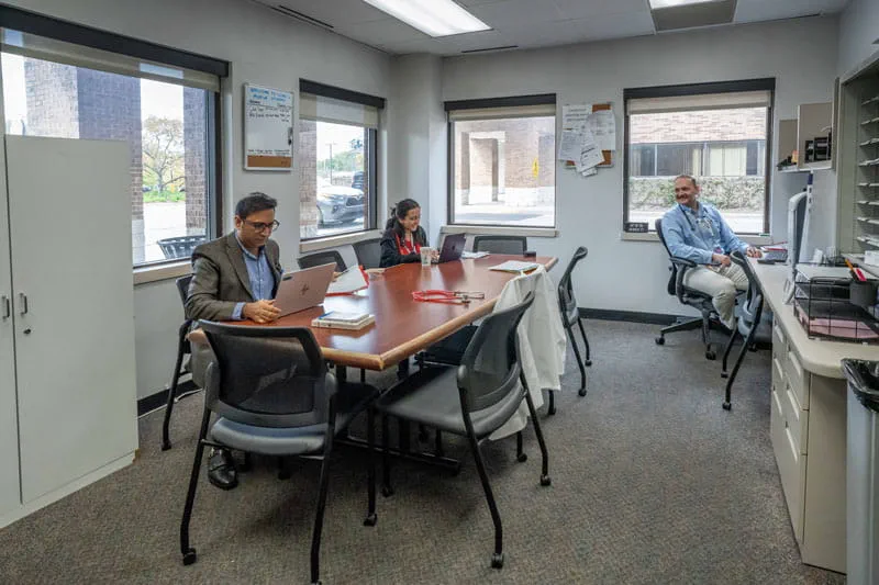 Staff working in a shared work space