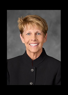 Portrait of Kelly Baird-Cox