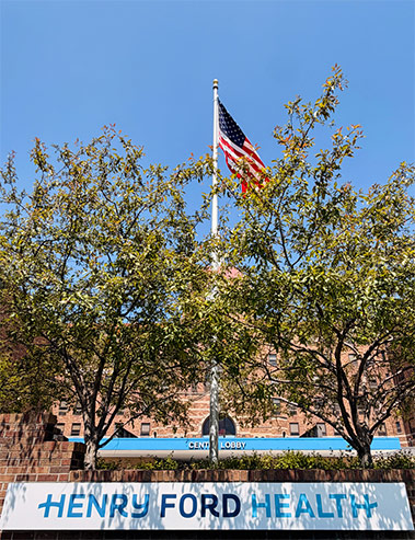  Henry Ford St. John Hospital exterior USA flag view