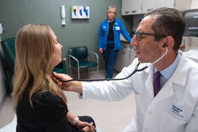 Physician taking care of a patient in a clinical setting