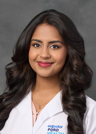 Headshot of Izma Khaliq