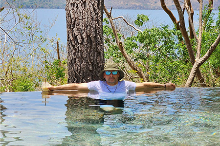 James relaxing in a body of water in nature