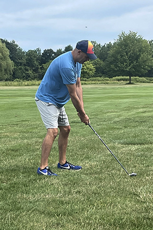 Ron playing golf
